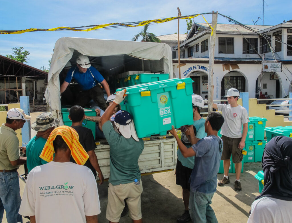 Men providing ShelterBox aid, following its foundation in Helston, Cornwall, one of many great Cornish charities.