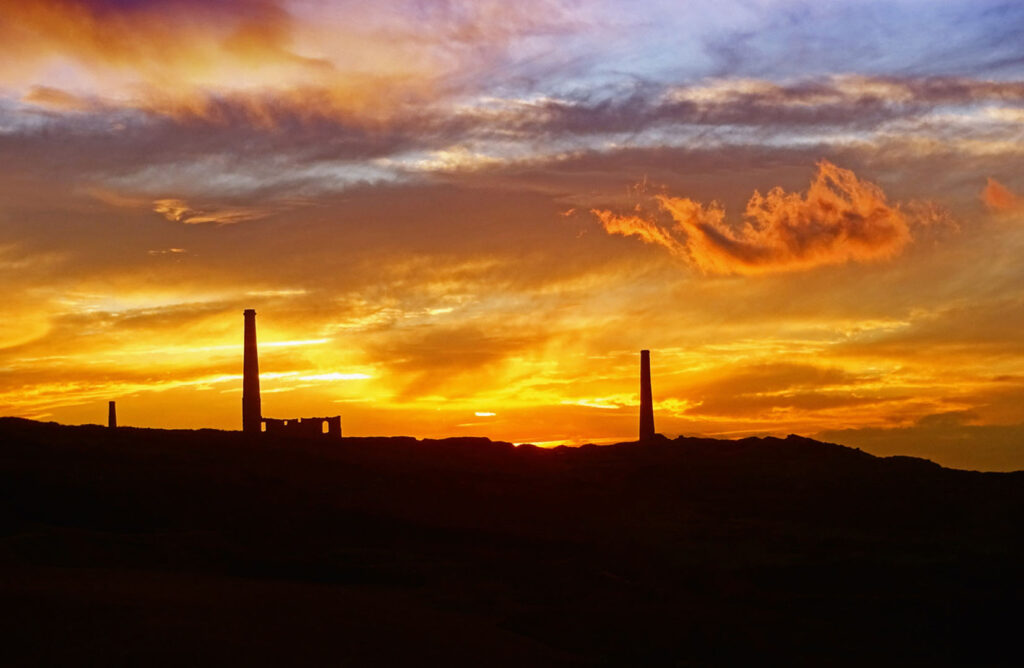 Geevor Tin mine, located in West Cornwall, at sunset, home to Cornish myths and legends.