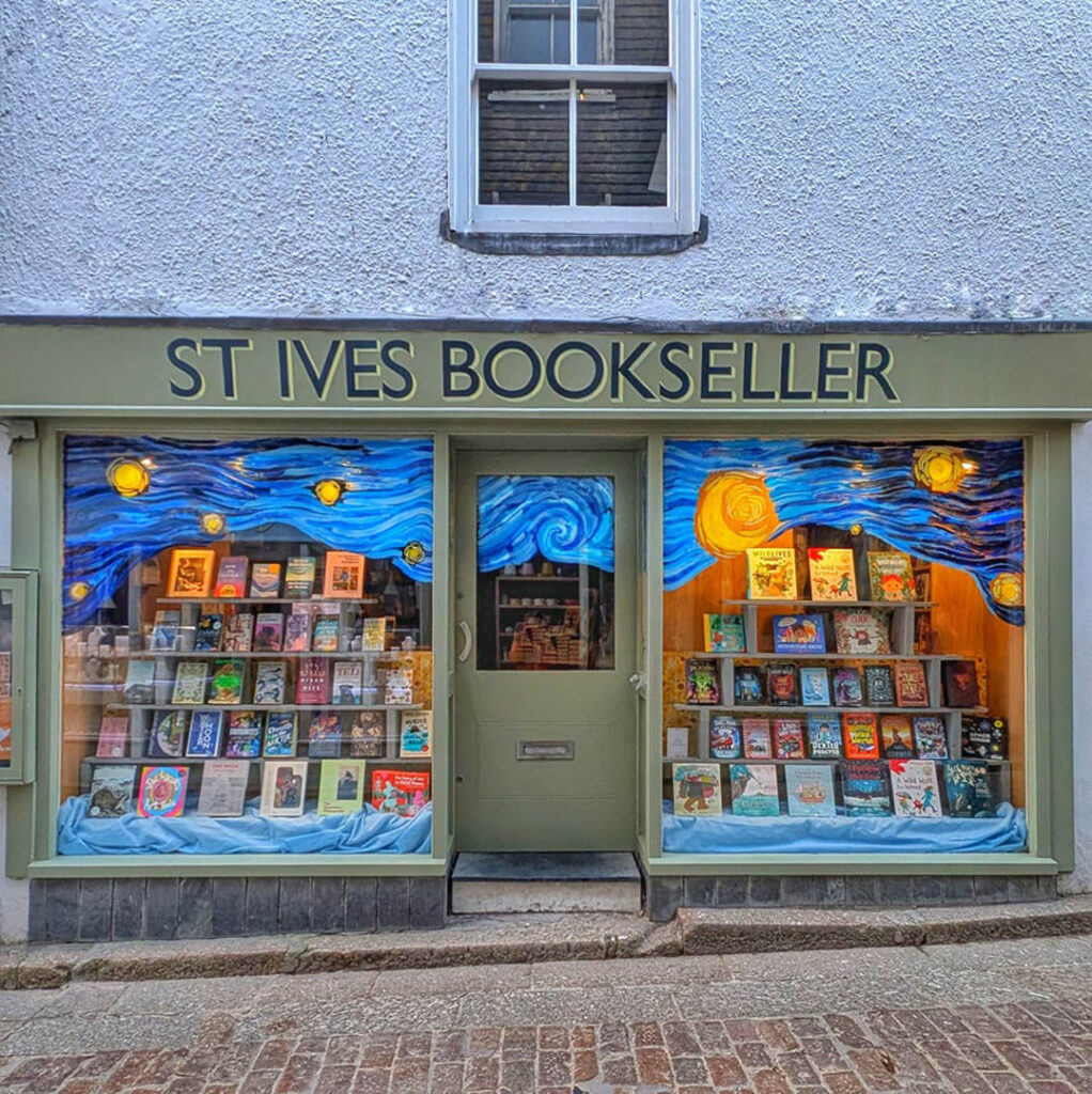 St Ives Bookseller in St Ives, Cornwall, featuring a cosy exterior with books displayed in the window, an independent shop in St Ives.